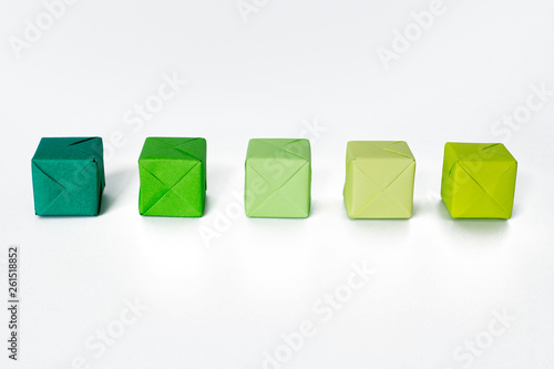 Green color shades origami cubes