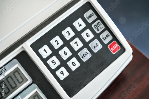 Closeup of electronic weight scale, detail of numeric keypad