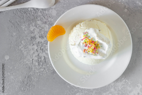 Cottage cheese dessert with apricot filling decorated with whipped cream. 
