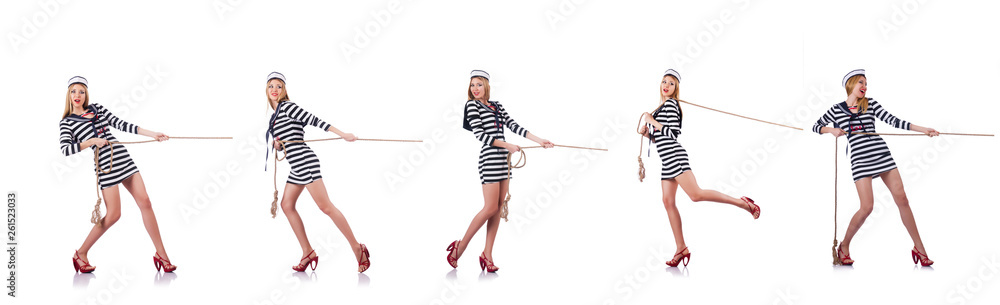 Woman sailor in tug of war concept Woman sailor in tug of war concept