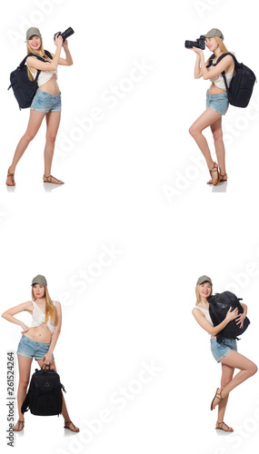 Beautiful woman in shorts with backpack and camera 