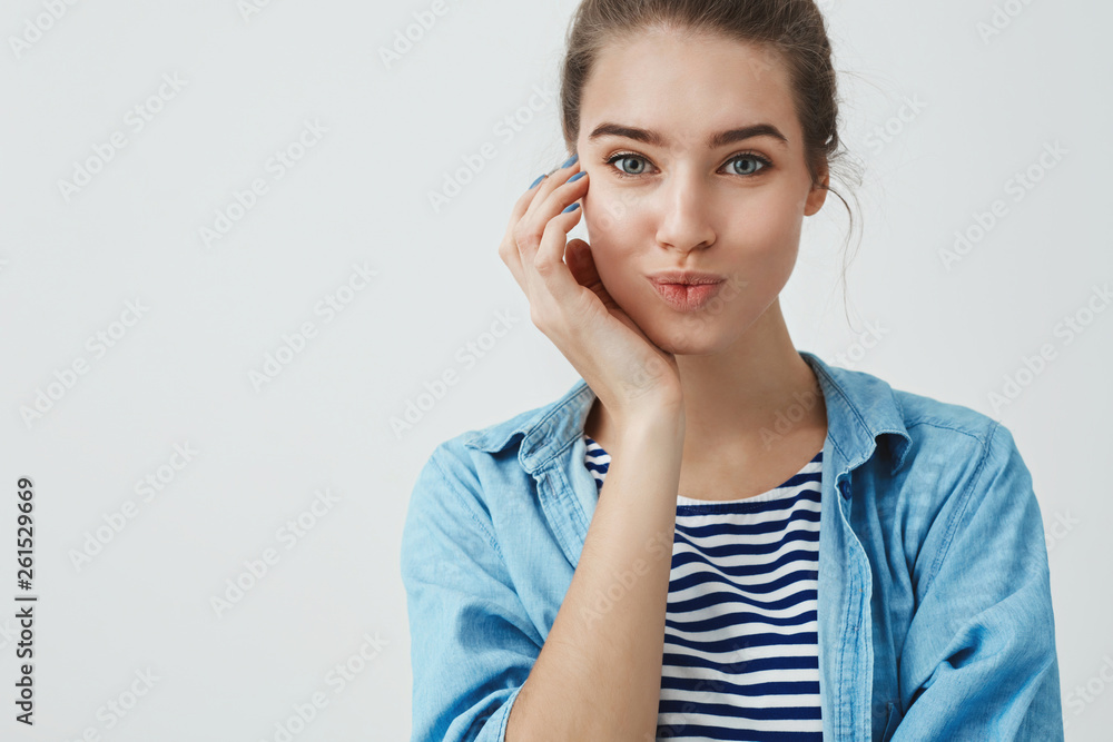 Close-up charming good-looking young mother taking skincare, smiling happy visiting beauty salon done nails, folding lips silly cute, touching cheek, having lucky fantastic day, white background Close-up charming good-looking young mother taking skincare, smiling happy visiting beauty salon done nails, folding lips silly cute, touching cheek, having lucky fantastic day, white background