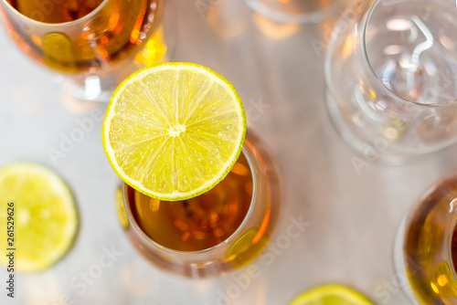 Golden rum with slice of lemon