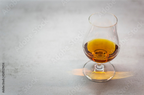 Glass of premium alcoholic drink (rum, cognac, whiskey)