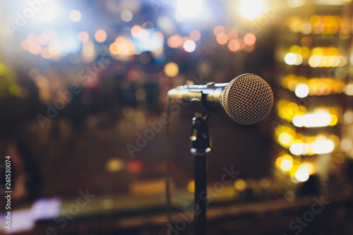 Photography Close up microphone on stage in concert hall restaurant or conference room blurred background