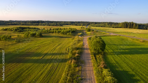 Top view of a country road through an agricultural field © Konstantin