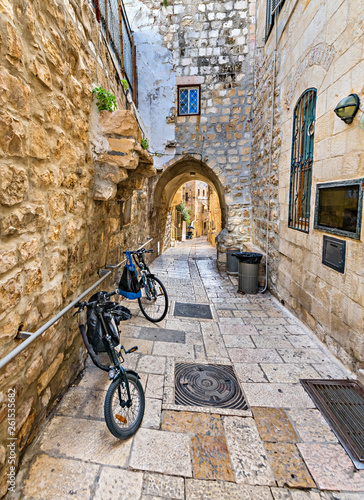 Ancient narrow street in old city of Jerusalem, Israel