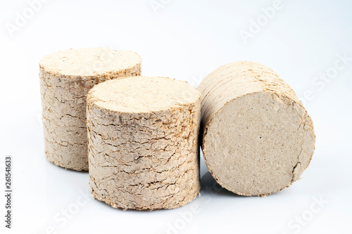 Wooden briquettes isolated on white background.