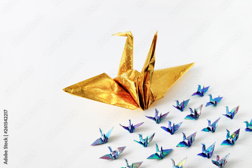Fototapeta premium Leadership Gold paper bird object concept isolated on white background