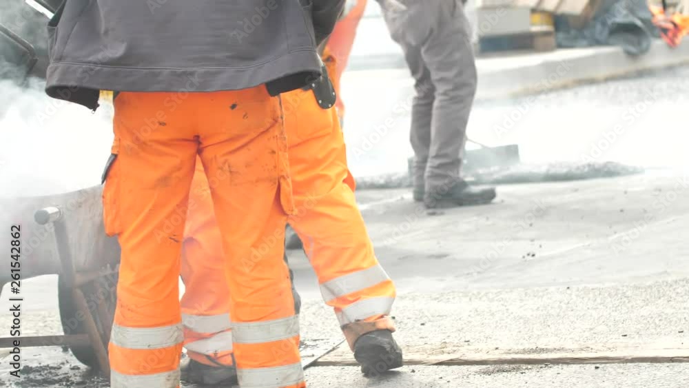 Street resurfacing. Fresh asphalt construction. Bad road Street resurfacing. Fresh asphalt construction. Bad road