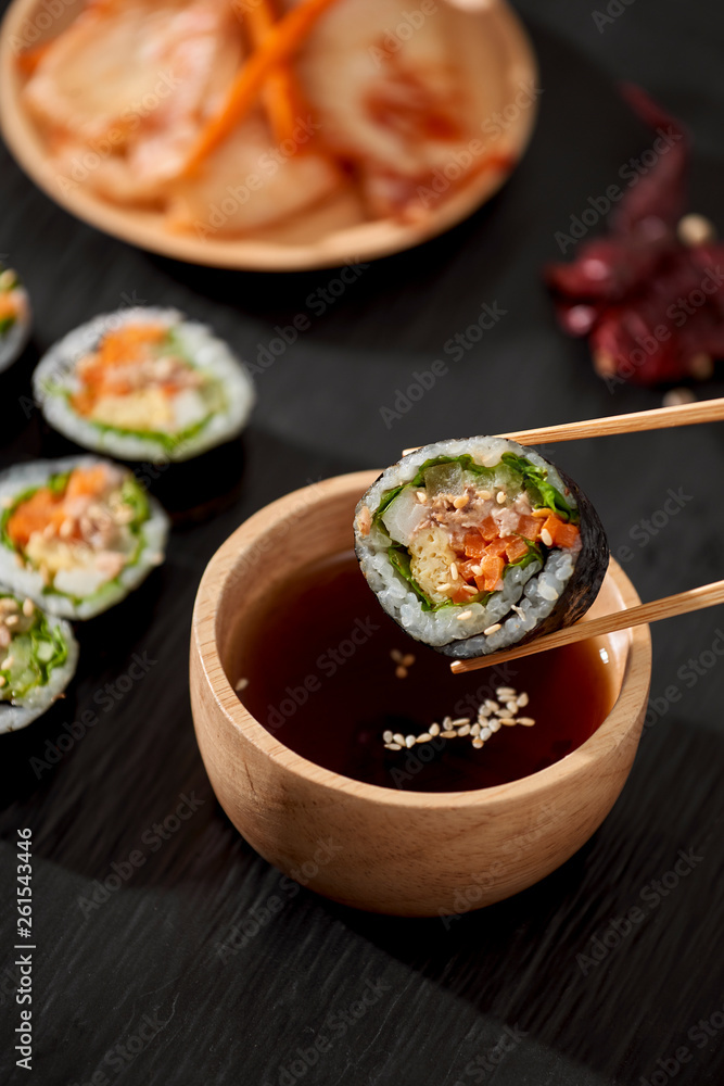 Korean roll Gimbap(kimbob) made from steamed white rice (bap) and various other ingredients Korean roll Gimbap(kimbob) made from steamed white rice (bap) and various other ingredients