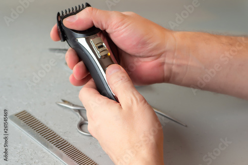 Hair clipper in male hands....