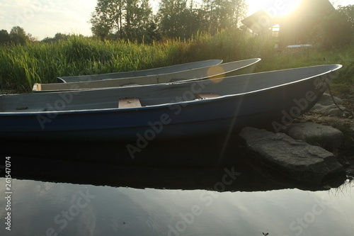 old pella boats on the lake in the sun