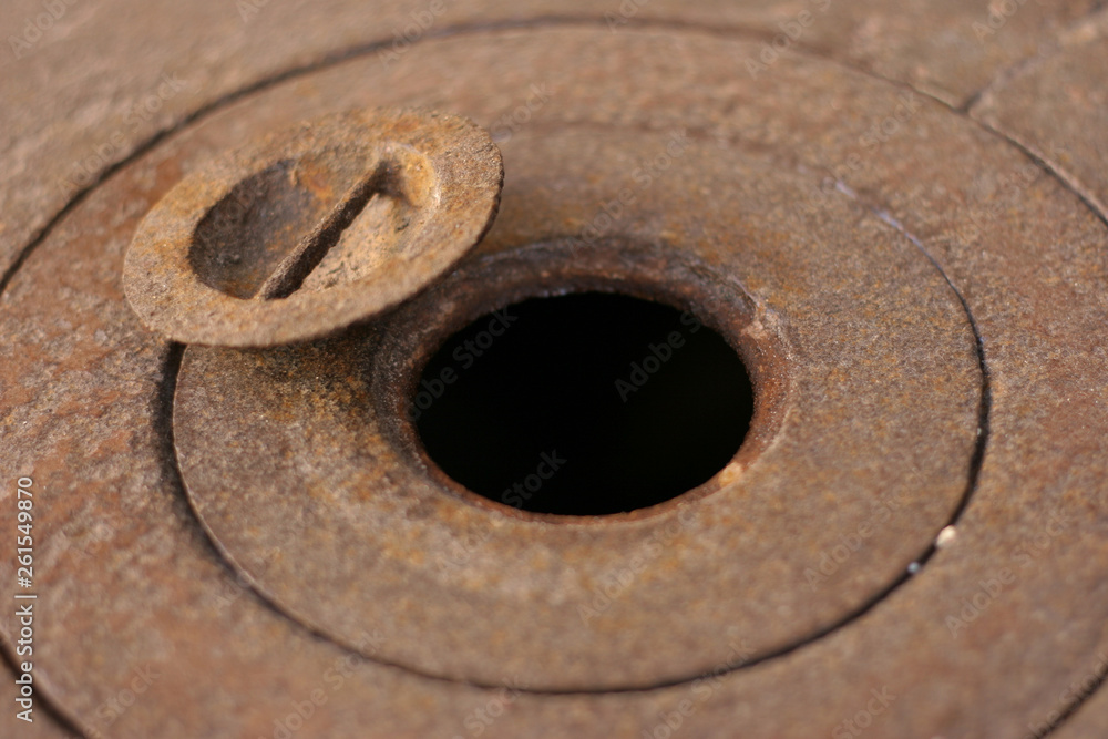 Rust old iron stove open close-up traditional equipment cover base Rust old iron stove open close-up traditional equipment cover base