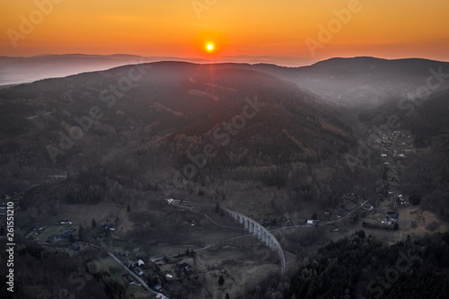 The railway viaduct was built near the village of Novina on the line from Liberec to Česká Lípa between 1898 and 1900. The viaduct, which has 14 arches, is 230 meters long and approximately 29 meters 