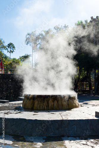 Famous hot spring well in Raksa Warin public park, Ranong, Thailand. photo