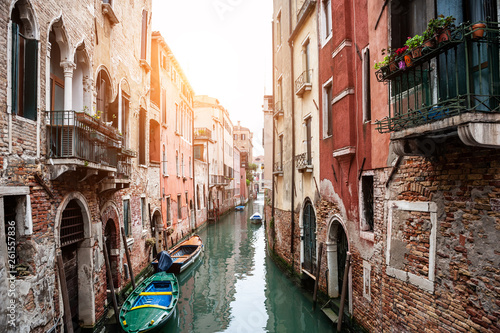 Scenic canal with old architecture in Venice, Italy.