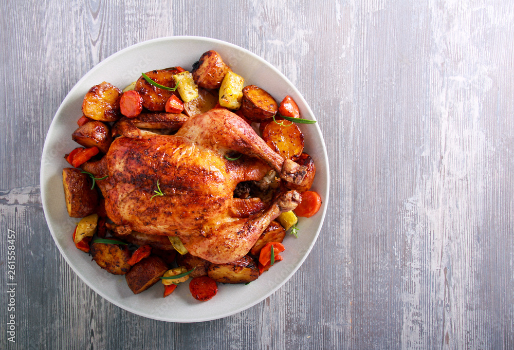 Roast chicken with vegetables on plate Roast chicken with vegetables on plate