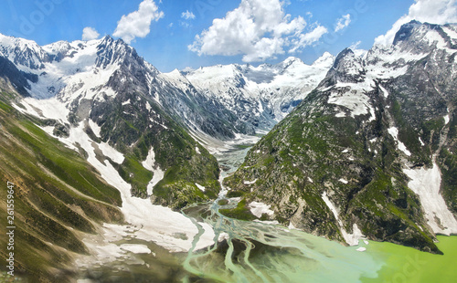 A river flowing between the mountains in Sheshnag lake located in Kashmir, Himalaya