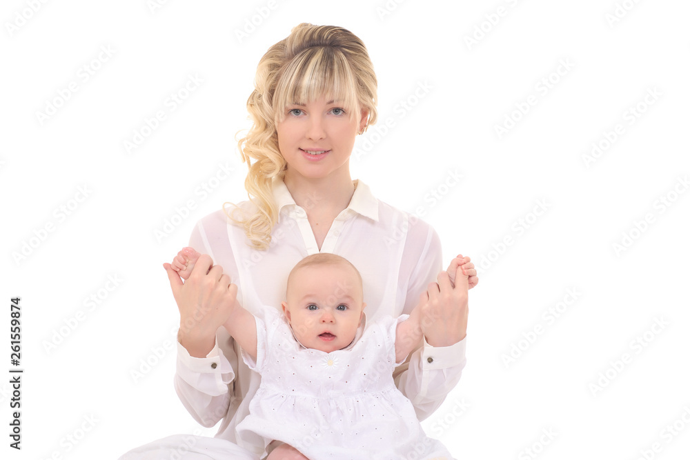 cheerful beautiful young woman holding baby in hands
