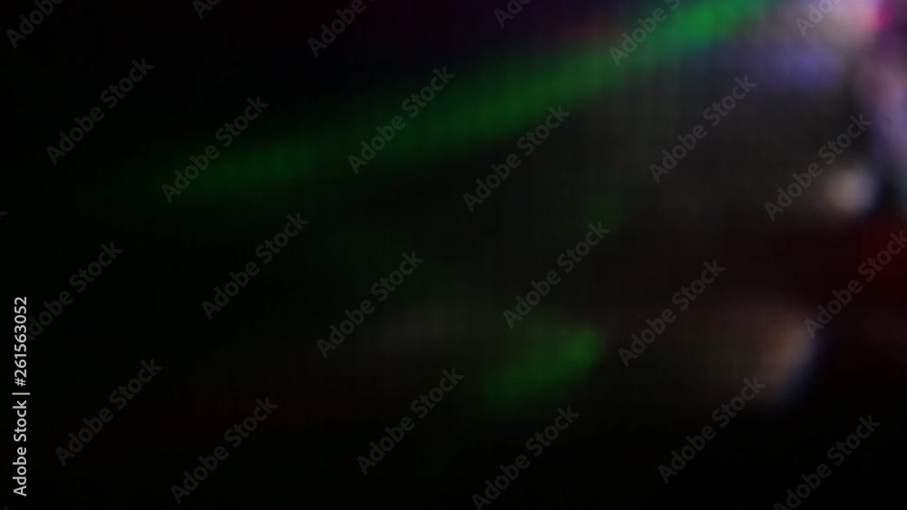 Blurred multicolored rays of light replacing each other Blurred multicolored rays of light replacing each other