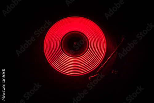 Concept of speed - Trail of fire and smoke - Vinyl record. Burning vinyl disk. Turntable vinyl record player. Retro audio equipment for disc jockey. Sound technology