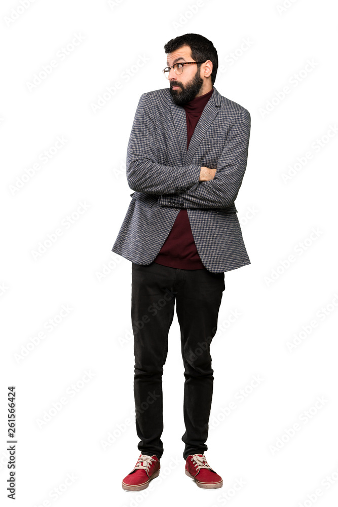 Handsome man with glasses making doubts gesture while lifting the shoulders over isolated white background Handsome man with glasses making doubts gesture while lifting the shoulders over isolated white background