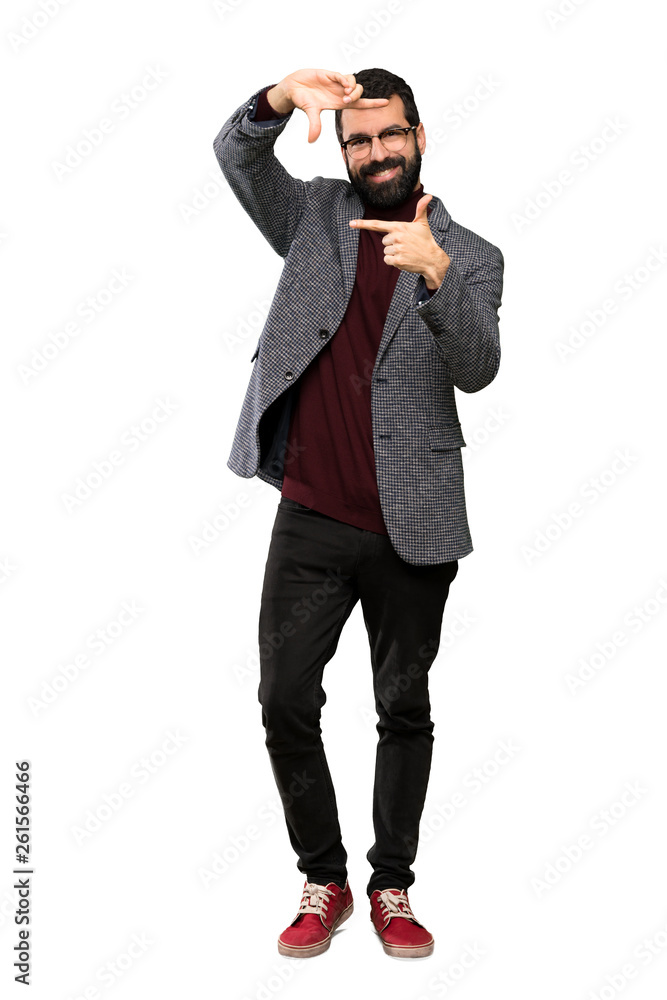 Handsome man with glasses focusing face. Framing symbol over isolated white background Handsome man with glasses focusing face. Framing symbol over isolated white background