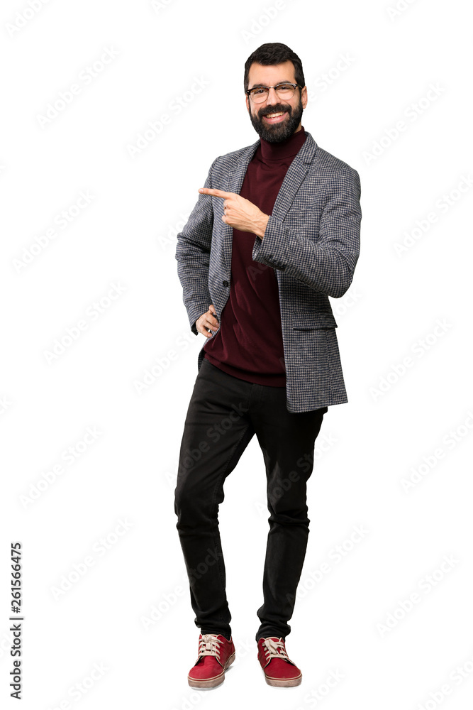 Handsome man with glasses pointing to the side to present a product over isolated white background Handsome man with glasses pointing to the side to present a product over isolated white background