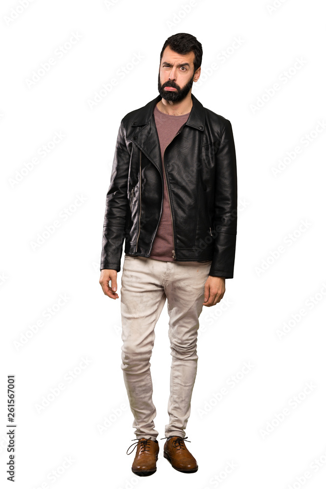 Handsome man with beard with sad and depressed expression over isolated white background Handsome man with beard with sad and depressed expression over isolated white background