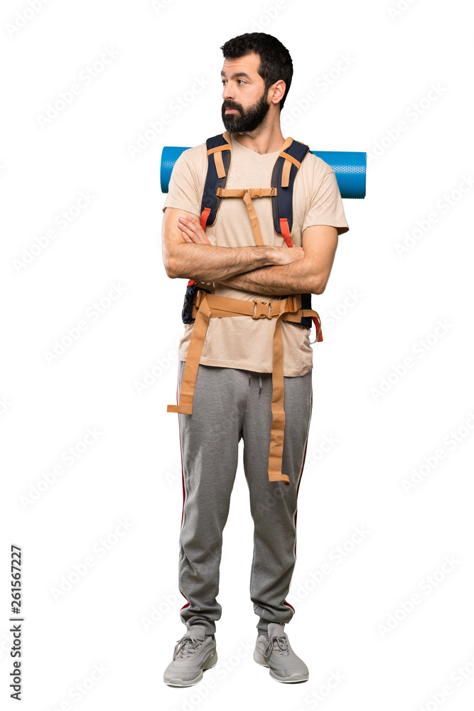 Hiker man portrait over isolated white background Hiker man portrait over isolated white background
