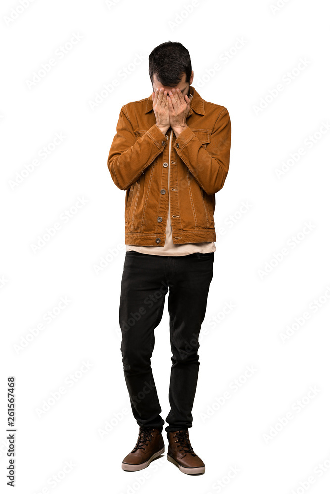 Handsome man with beard with tired and sick expression over isolated white background Handsome man with beard with tired and sick expression over isolated white background