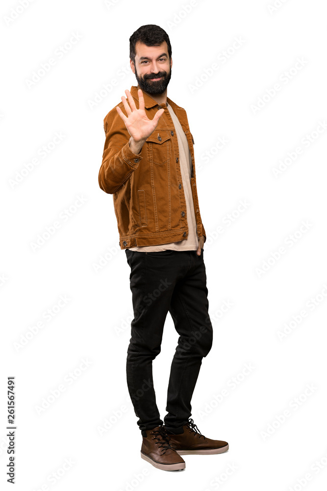 Handsome man with beard counting five with fingers over isolated white background Handsome man with beard counting five with fingers over isolated white background
