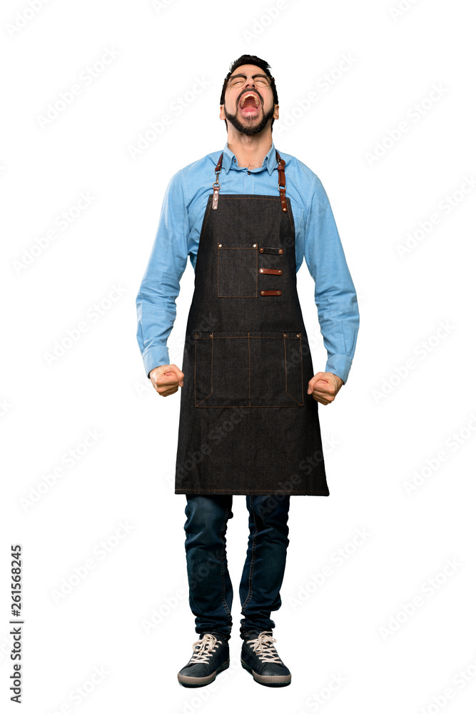 Full-length shot of Man with apron shouting to the front with mouth wide open over isolated white background