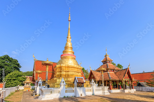 Golden pagoda and Buddha pavilion at Wat Pong Sanuk temple and museum in Lampang  North of Thailand