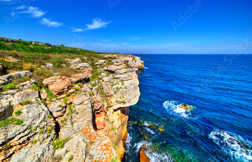 Stunningly beautiful landscape with rocky shore and blue sea
