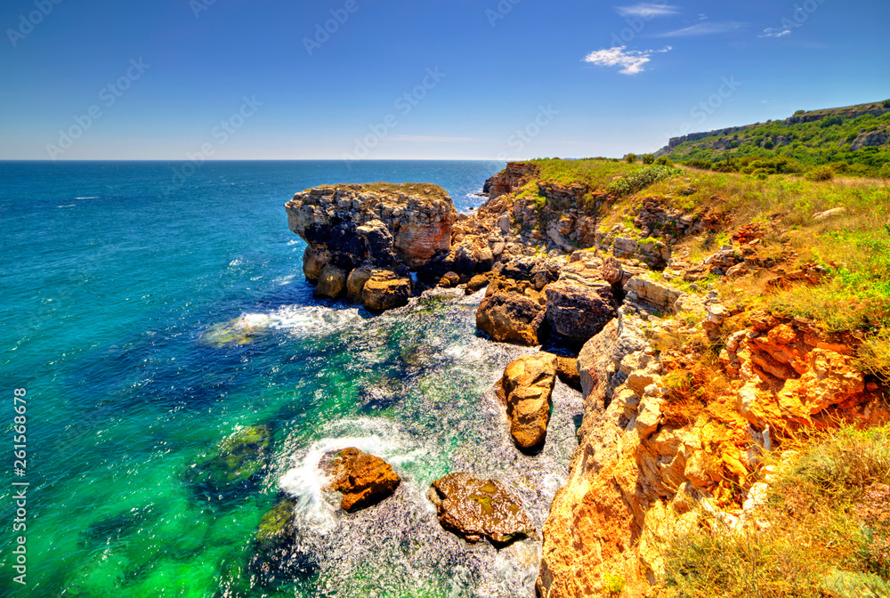 Stunningly beautiful landscape with rocky shore and blue sea Stunningly beautiful landscape with rocky shore and blue sea
