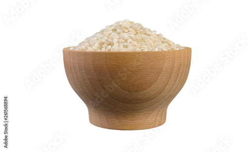 arborio risotto short grain rice in wooden bowl isolated on white background. nutrition. food ingredient.
