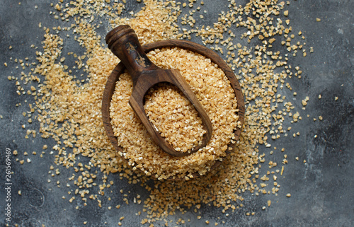 Dry bulgur wheat grains photo