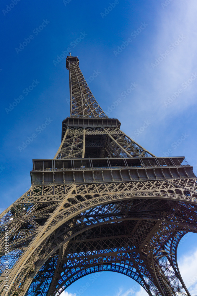 Low angle view close up Eiffel Tower in blue sky day