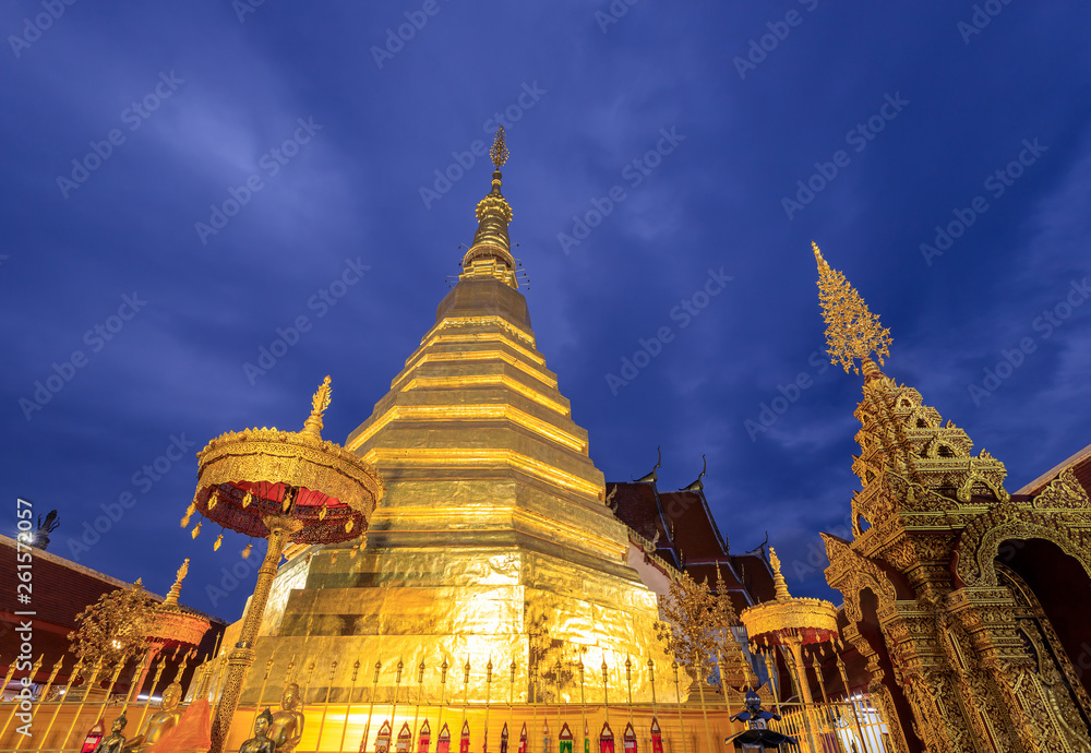 Fototapeta premium Golden pagoda for year of tiger at Wat Prathat Cho Hae Temple in Phrae province, north of Thailand