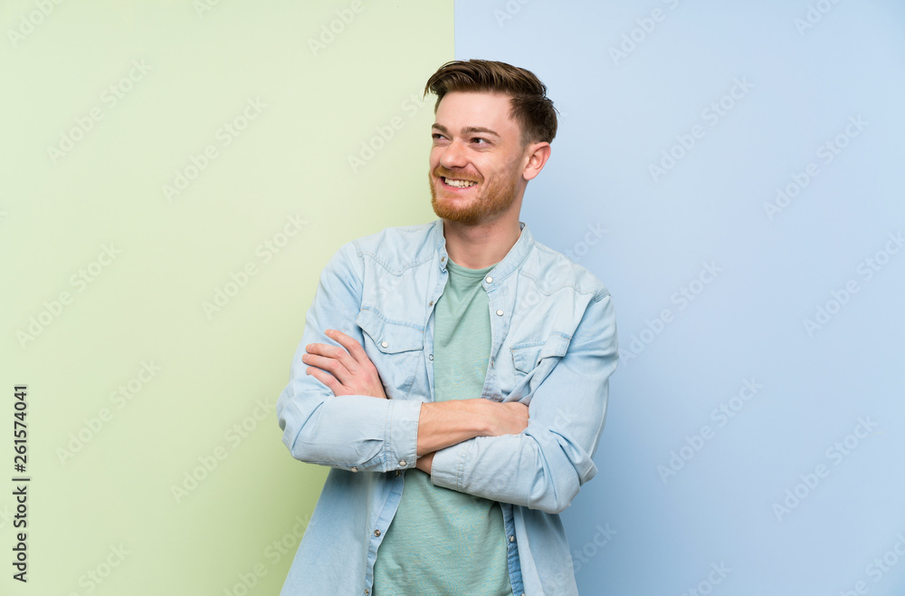 Redhead man over colorful background happy and smiling Redhead man over colorful background happy and smiling