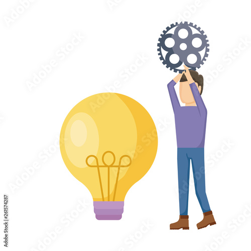 young man with gear pinion and light bulb