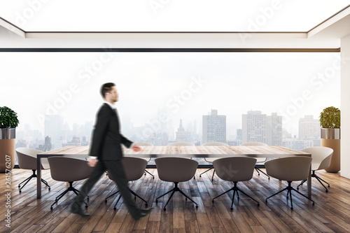 Young businessman in meeting room