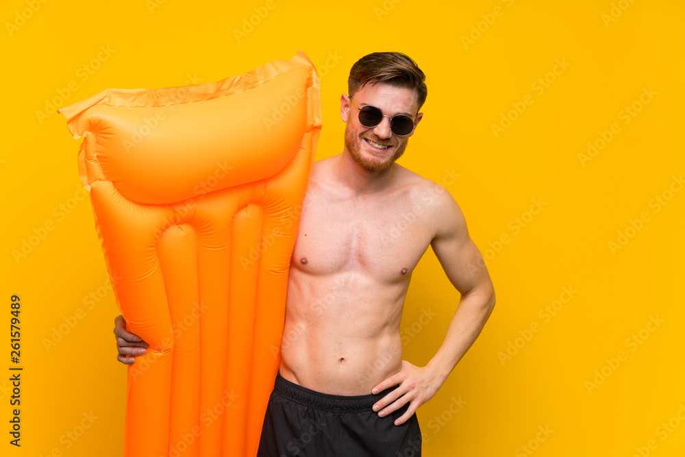 Redhead man in summer holidays laughing Redhead man in summer holidays laughing