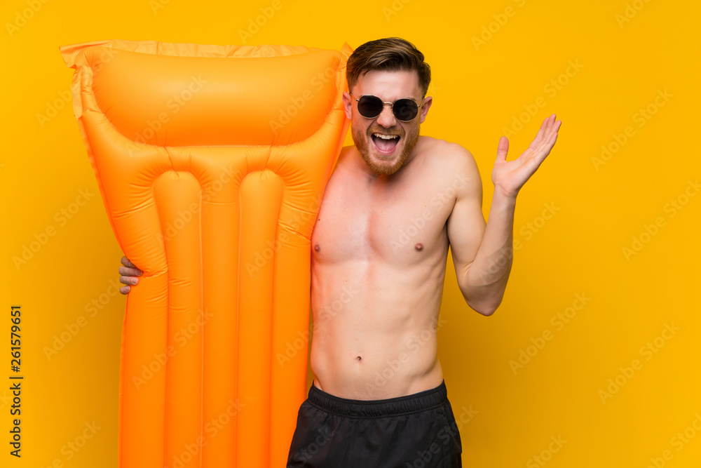 Redhead man in summer holidays laughing Redhead man in summer holidays laughing