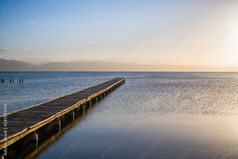 A wooden dock make up for a beautiful rural pier at the Gulf of Cariaco in Venezuela