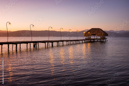 Wooden dock and a rustic hut make up for a beautiful rural pier at the Gulf of Cariaco in Venezuela © DOUGLAS