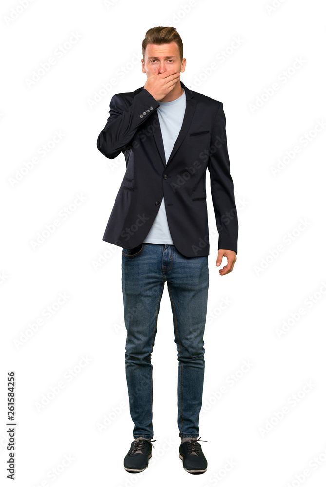 Blonde handsome man covering mouth with hands Blonde handsome man covering mouth with hands