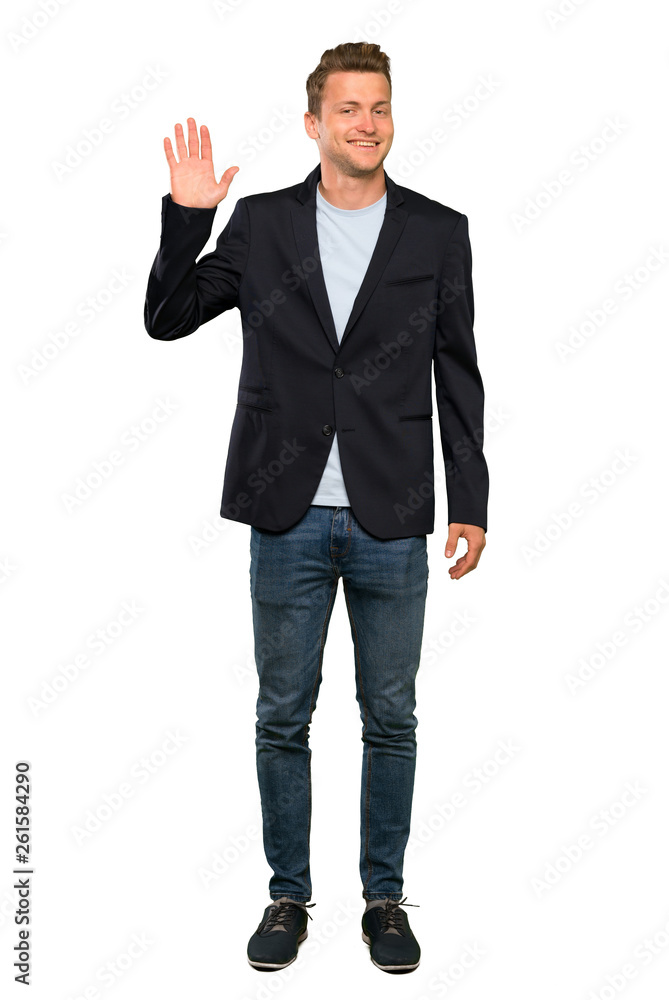 Blonde handsome man saluting with hand with happy expression Blonde handsome man saluting with hand with happy expression